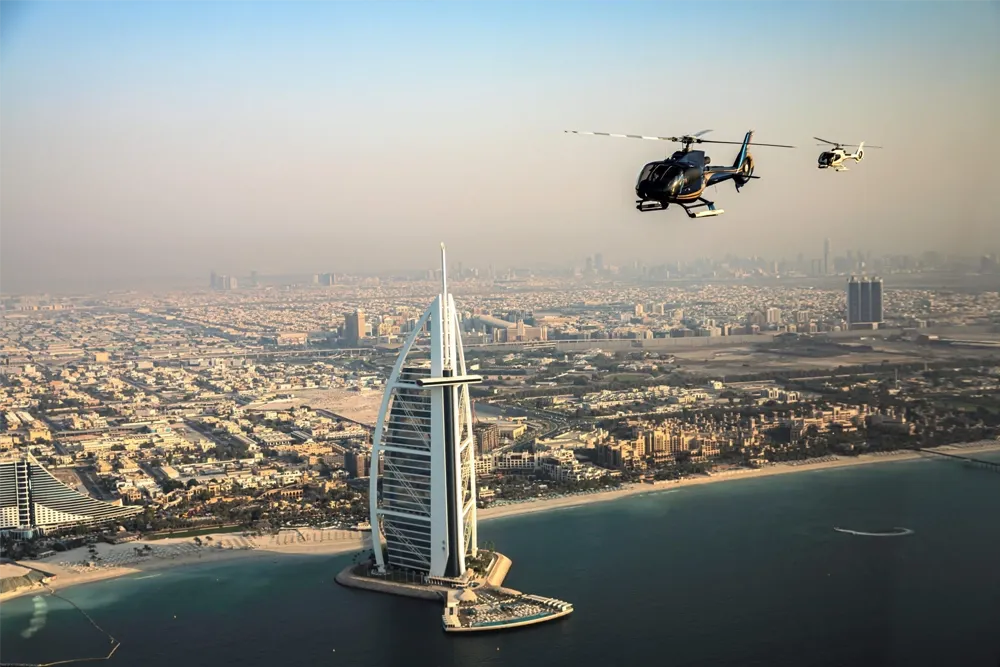 dubai helicopter tour pay with tamara and tabby